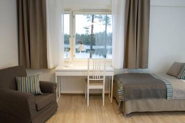 Фото номера Двухместный номер с 2 отдельными кроватями Отель Hotelli Lepolampi г. Эспоо 6